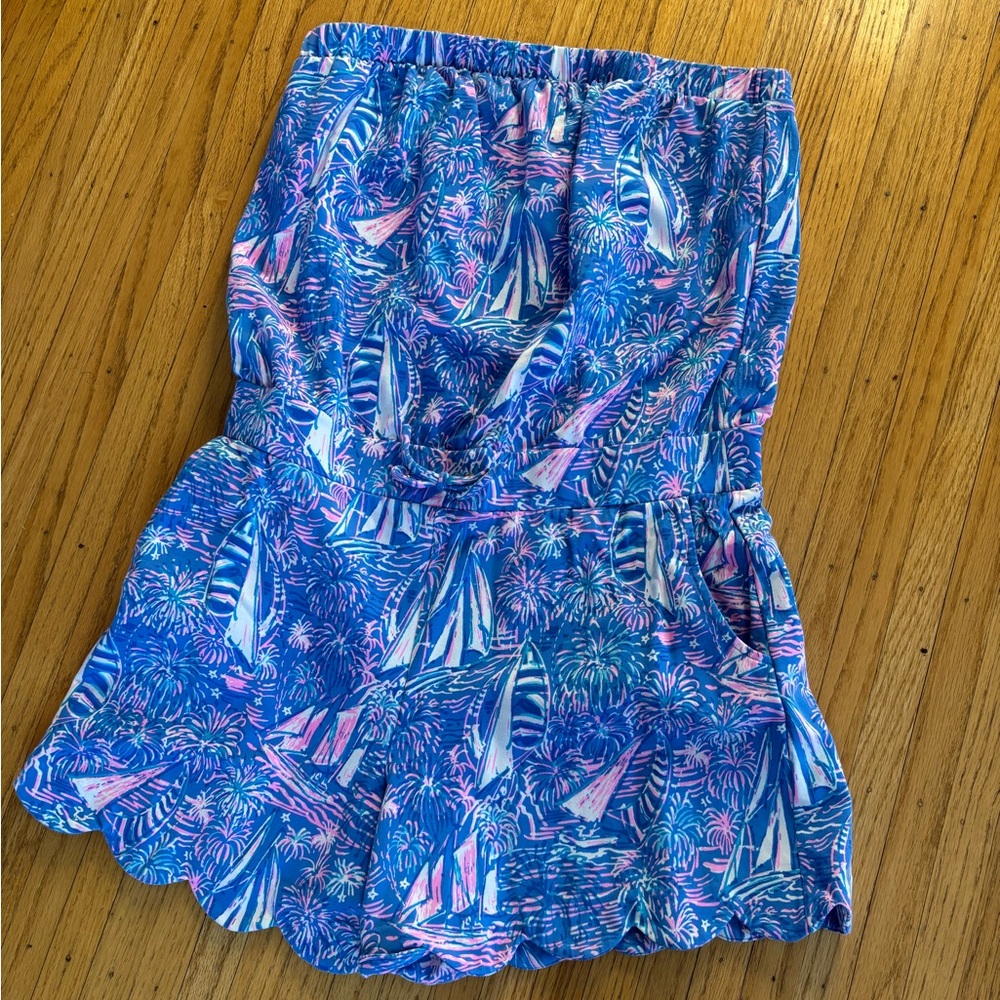 Lily Pulitzer romper with scalloped shorts.